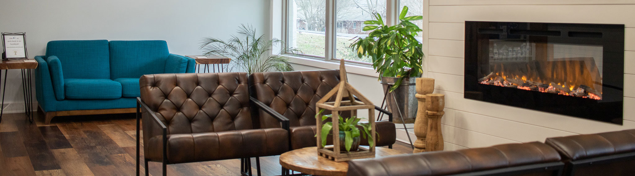 Waiting area with cozy gas fireplace in Tri-Cities Functional Medicine clinic.