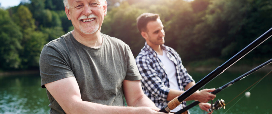 Father and son fishing who have autoimmune diseases