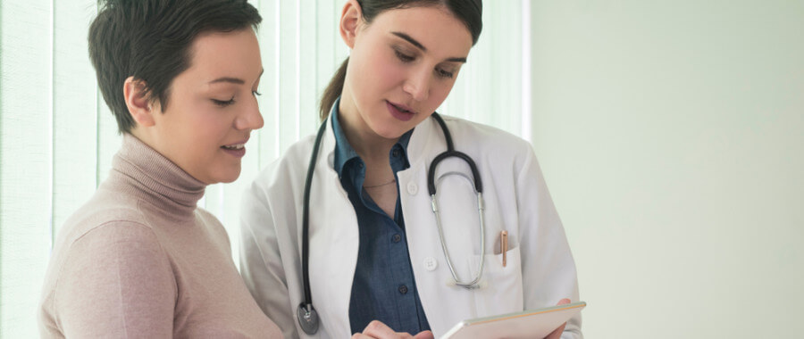 Patient talking with functional medicine doctor about heavy metal toxicity symptoms