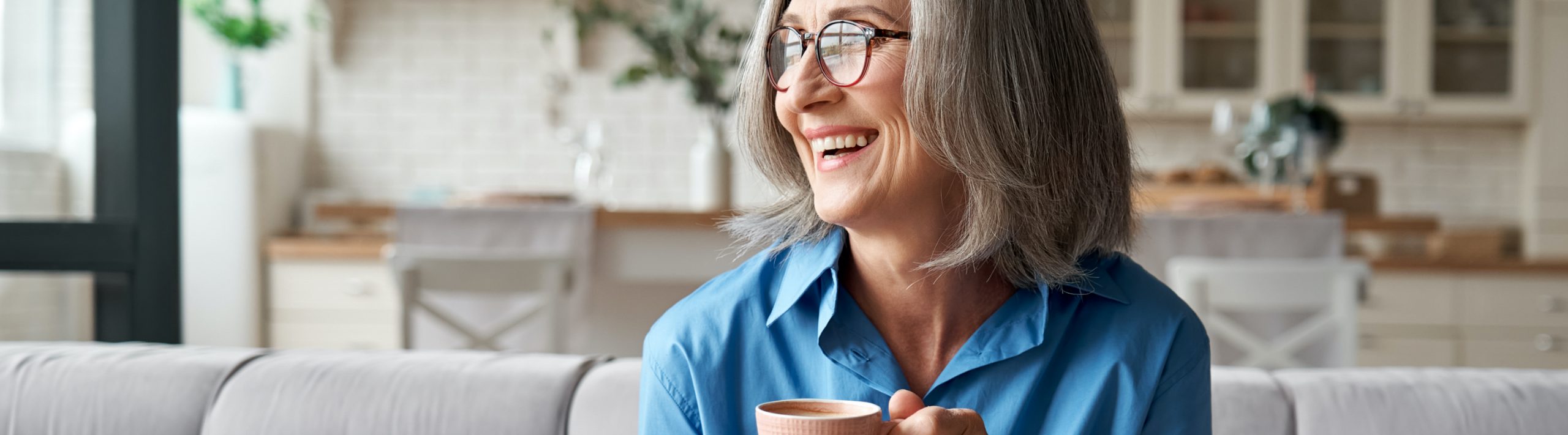 Woman having tea.
