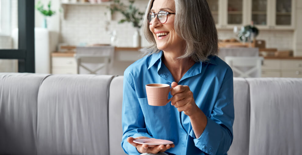 Woman having tea.